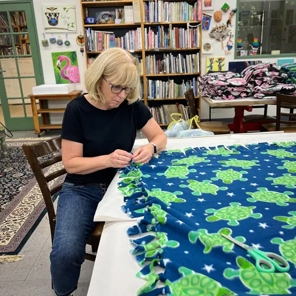 Woman Making a Blanket