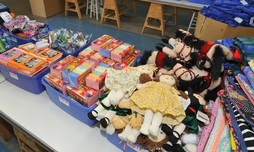 Table Full of Items Donated Goods