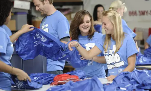 Two Volunteers at a Stuff-A-Thon