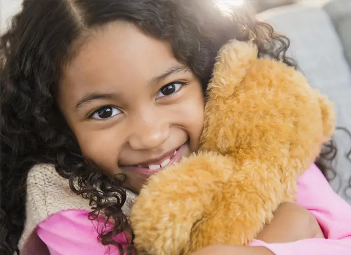 A Smiling Child Who Has Been Helped