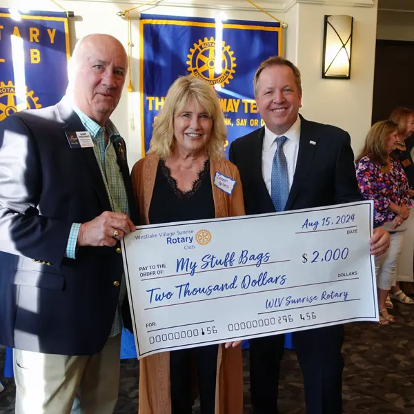 My Stuff Bags CEO Receives a Check from the Rotary Club of Westlake Village Sunrise