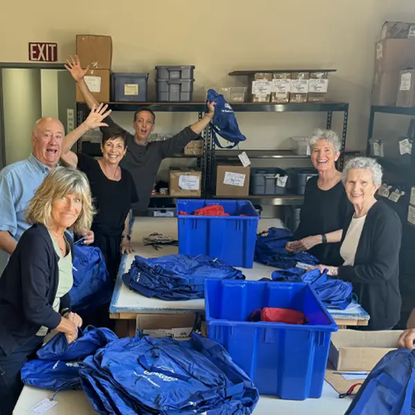 Group of Rotarians Packing Bags